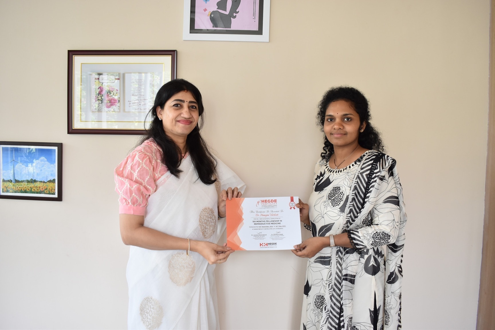 Dr. Manogna Reddy receiving her Fellowship in Reproductive Medicine certificate